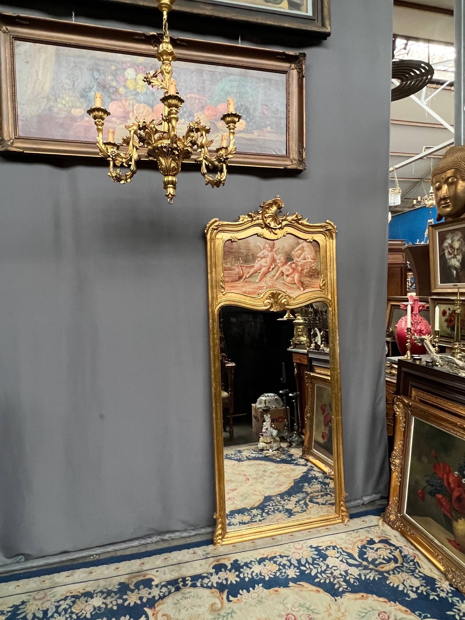Antique Rococo mirror with cherubs