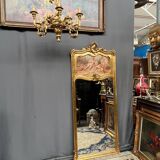 Antique rococo mirror with cupids