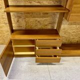 Modular wall-mounted bookcase in walnut