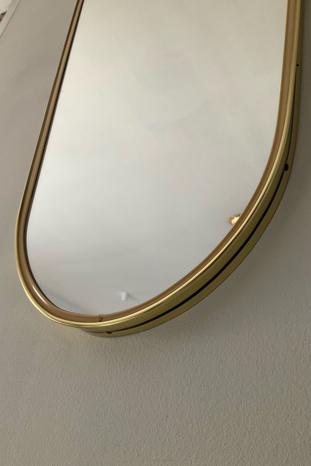 Asymmetrical free-form mirror from the 70s