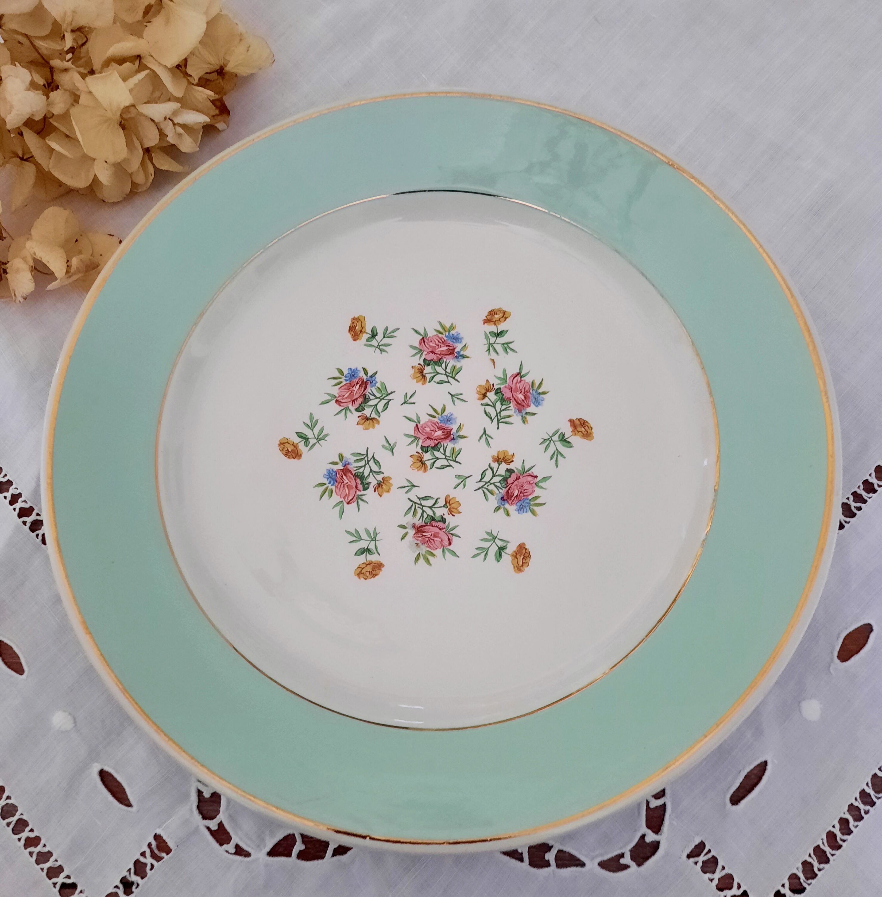 Mismatched old flat plates with gold