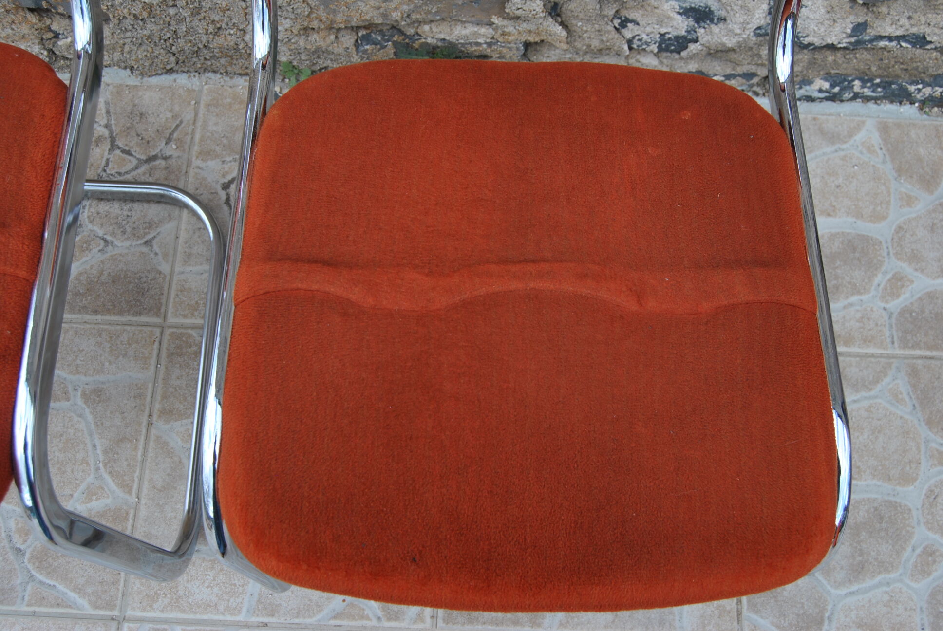Pair of orange velvet chairs Roche Bobois 70s