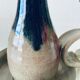 Candle holder in glazed ceramic