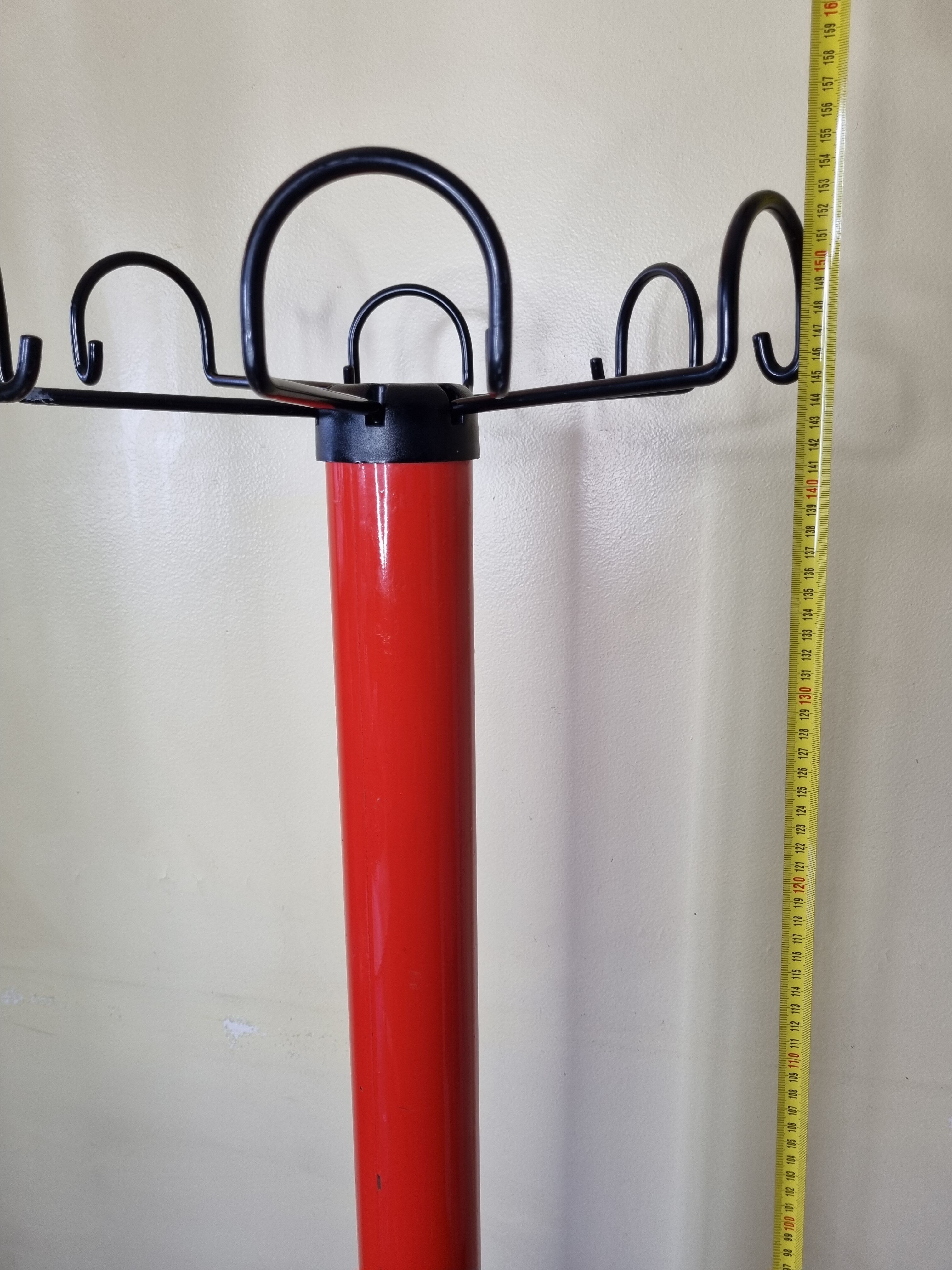 Coat rack in orange lacquered metal published by Seccose, 80s