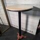 Bistro standing table with marble top and cast iron base.