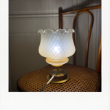 Brass table lamp and quilted glass