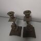 Pair of candlesticks with bronze dolphins