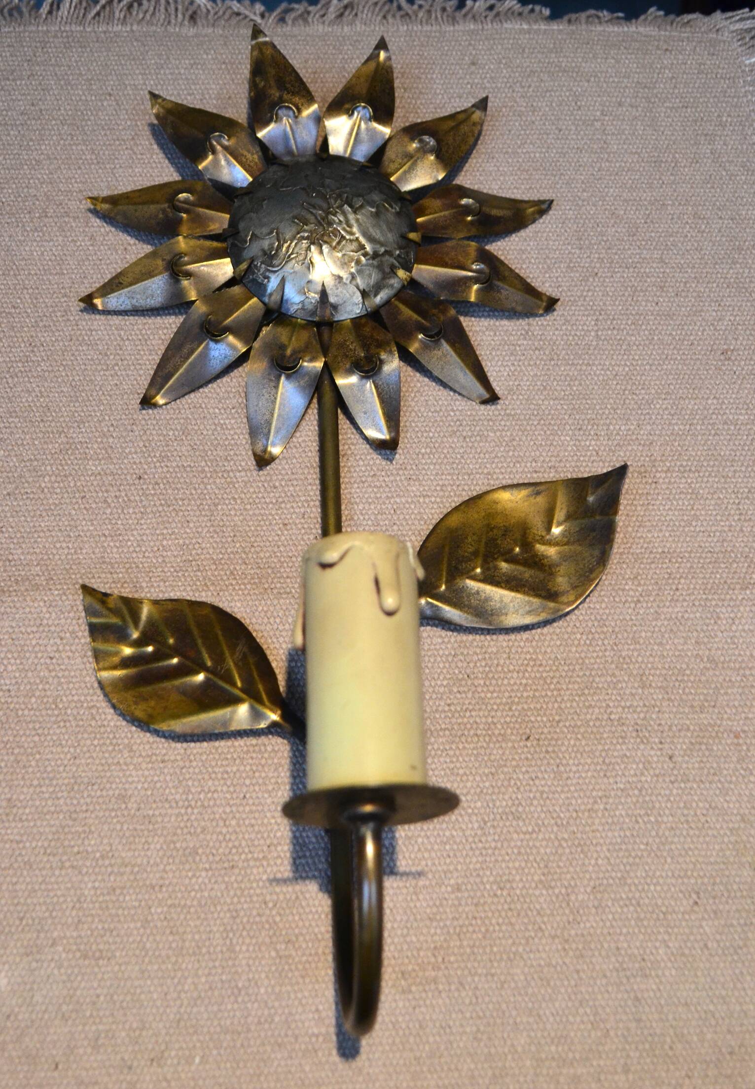 Brass flower wall light from the 1970s.