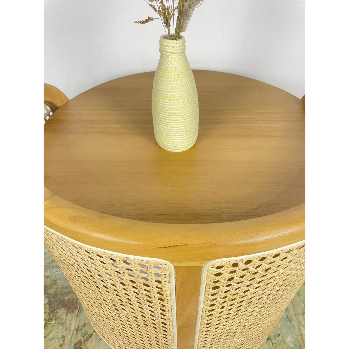 Coffee table made of teak and handcrafted rattan from Indonesia.