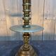 Pair of important brass candle holders