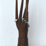 Carved wooden baguier hand