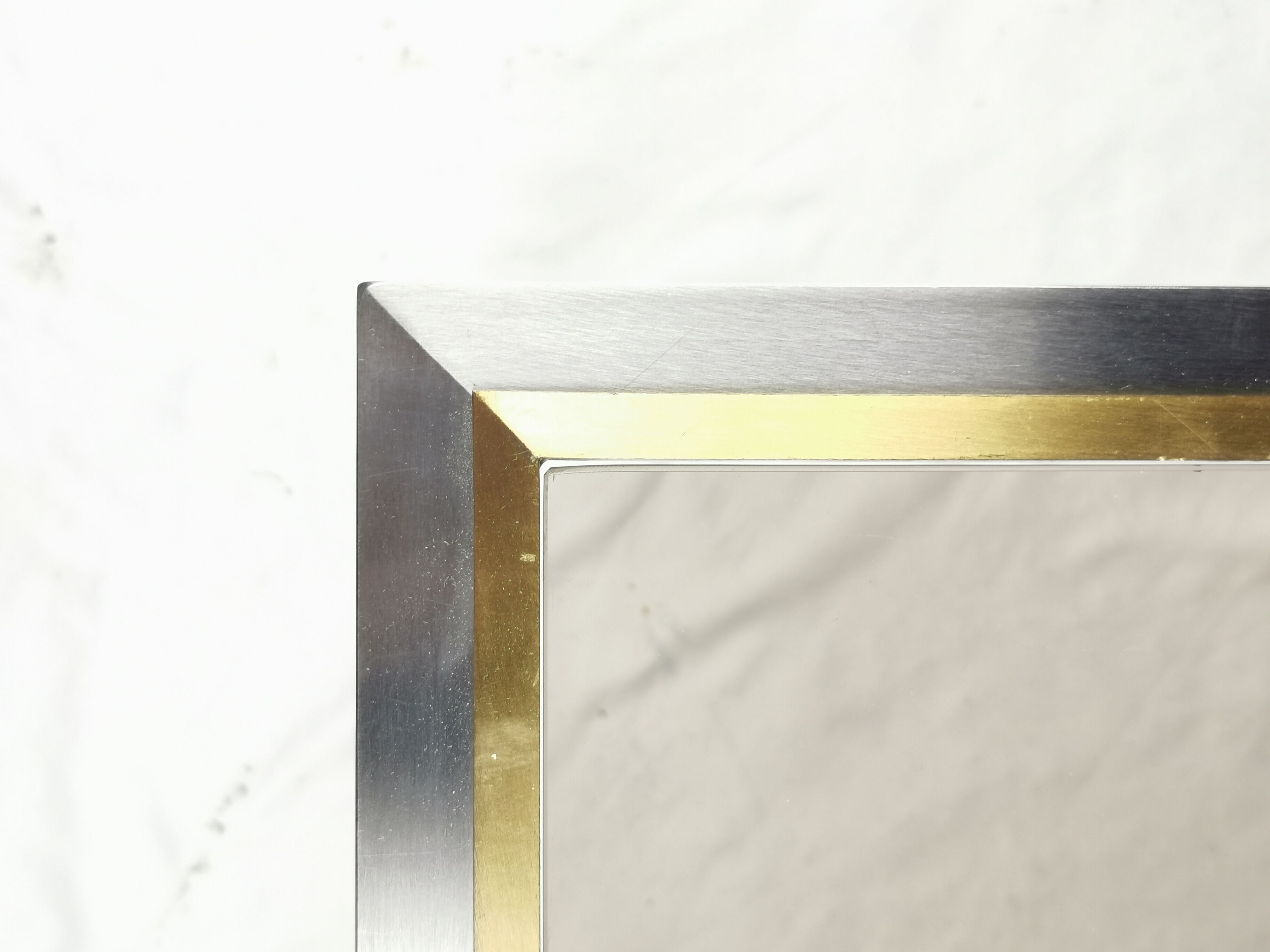 Suite of 5 coffee tables in chrome metal, brass, smoked glass. around 1970