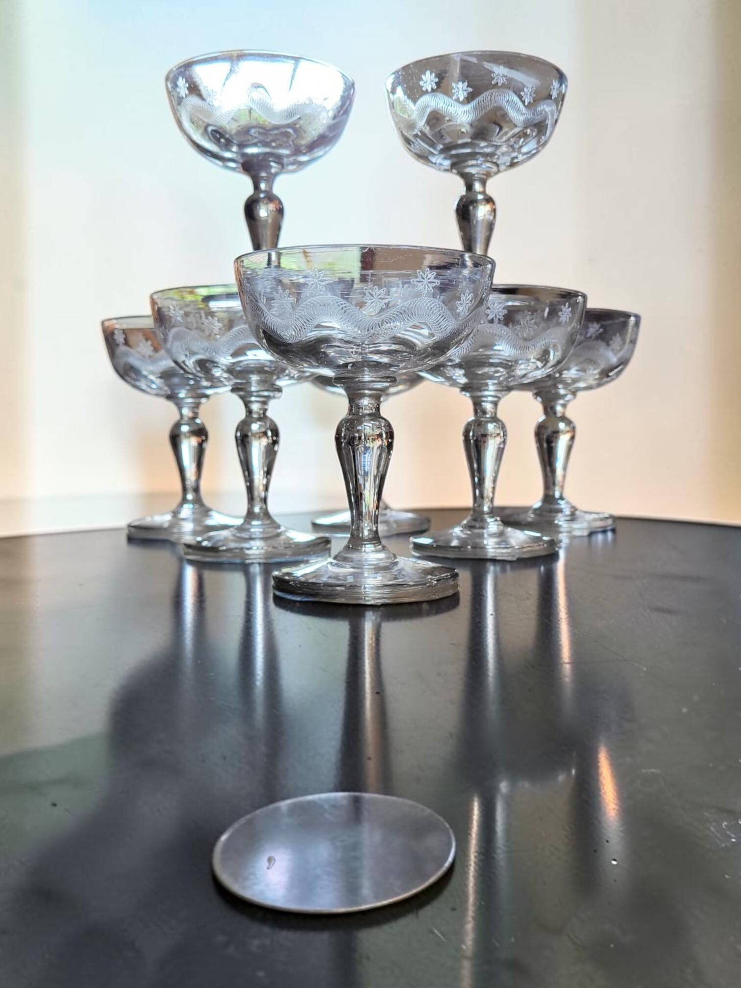 8 engraved glass champagne coupes from Meisenthal, Art Deco