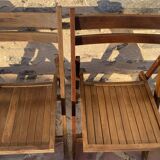 Three wooden folding chairs