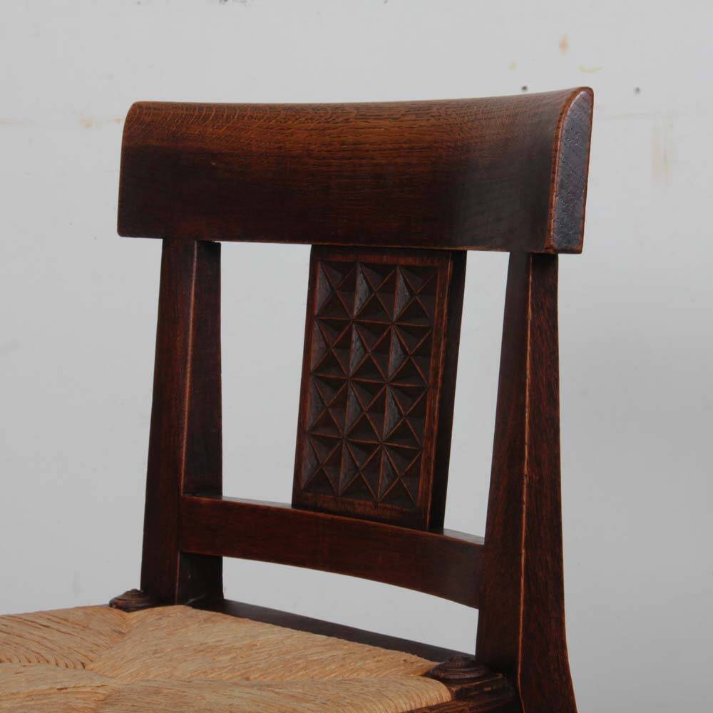 Set of 8 wooden chairs, Breton work from the 1940s.