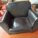 Mini black leather armchair for children