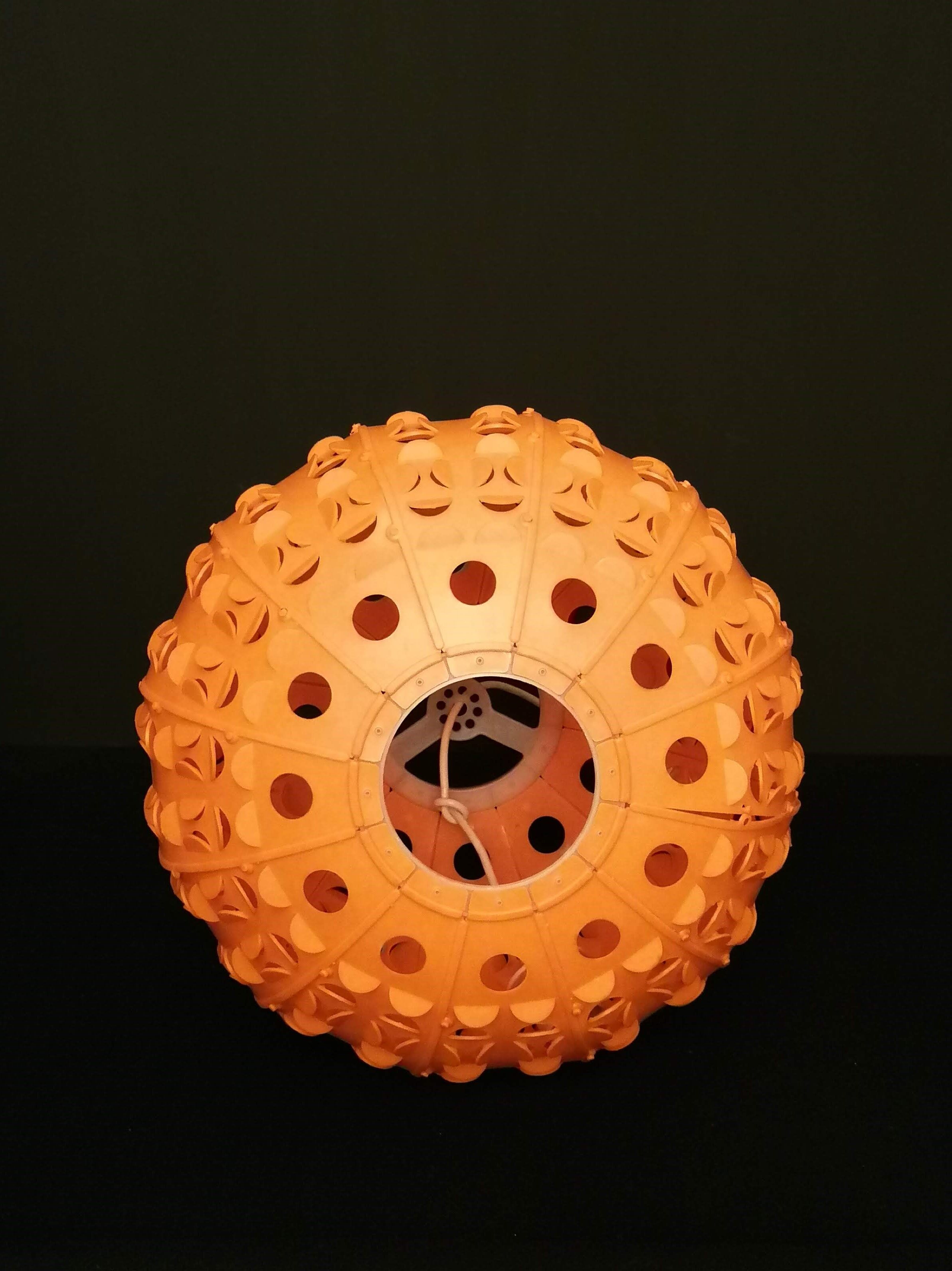 Year 70 suspension in orange plastic