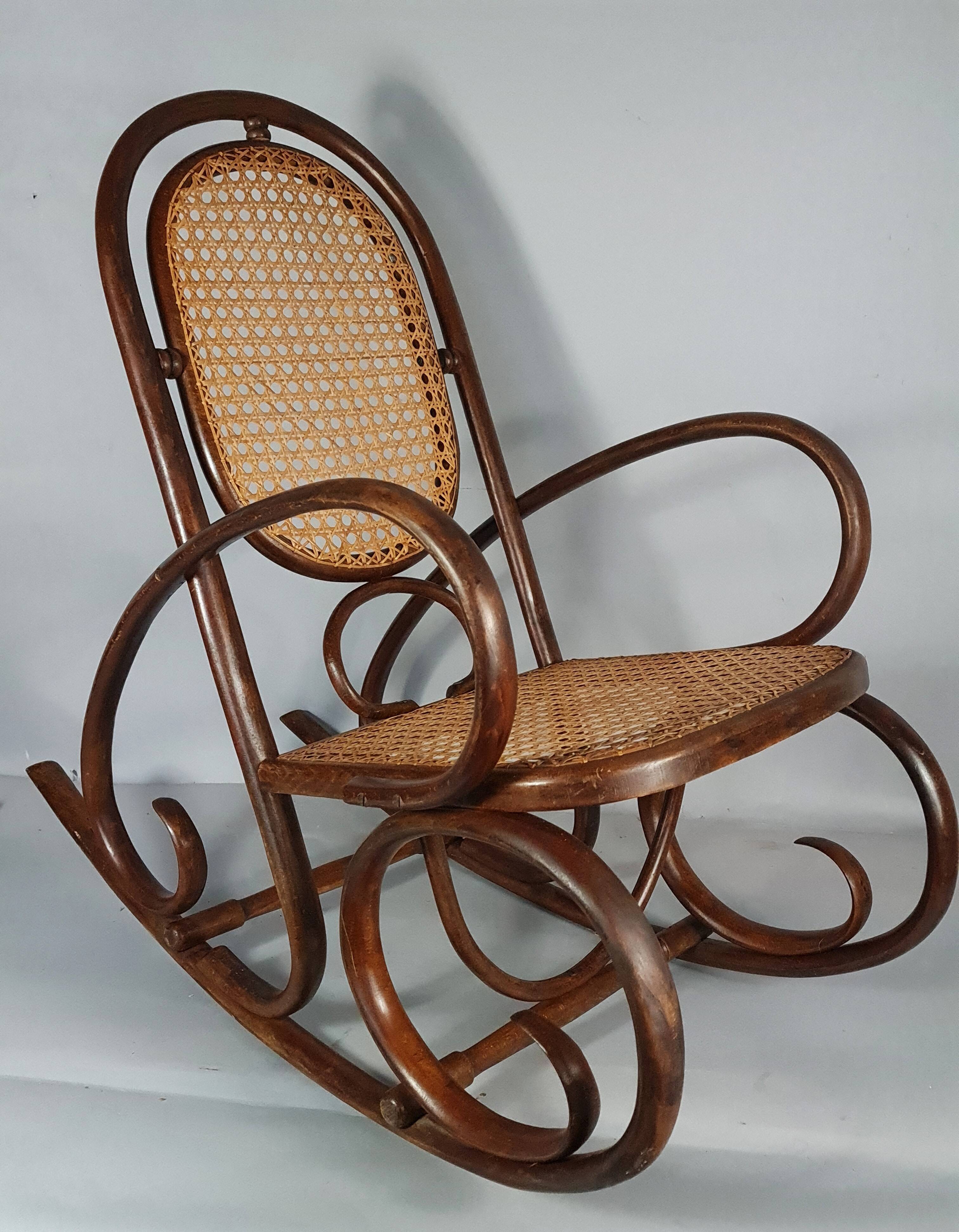 Vintage curved wood rocking chair for children with recent caning model D912.