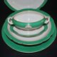 Paris porcelain set of 3 plates and a sauce boat with green border and gold monogram JC.