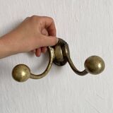Antique double coat hook in solid brass