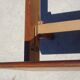 Antique teak bed with integrated bedside table