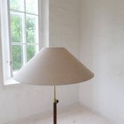 Mid-century brown leather and patinated brass floor lamp by Falkenbergs Belysning, Sweden, 1960s.