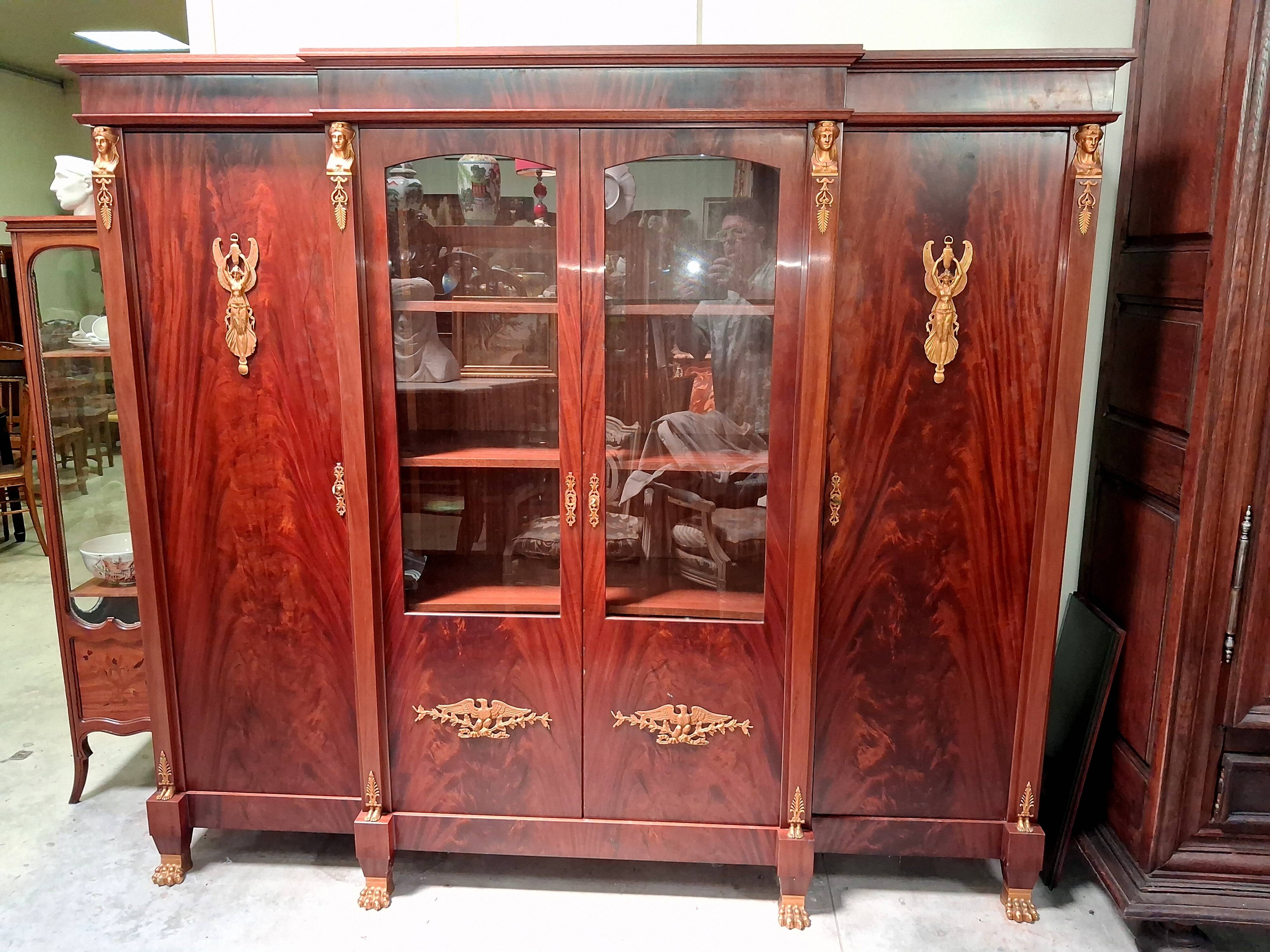 Empire-style library in flame mahogany – Gilded bronzes –