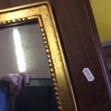 Miroir en bois et stuc doré