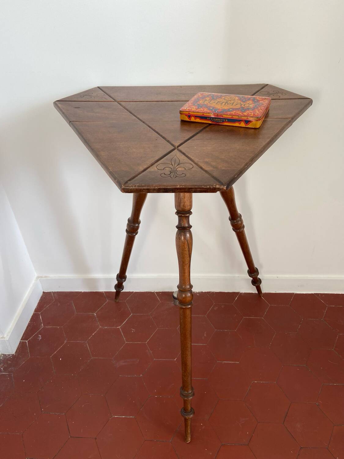 Old tripod side table
