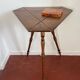 Old tripod side table