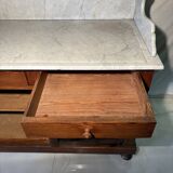 Antique wood and marble kitchen sideboard with carved backsplash