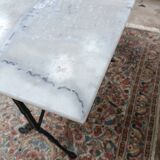 Bistro table with cast iron legs and marble top
