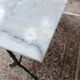 Bistro table with cast iron legs and marble top