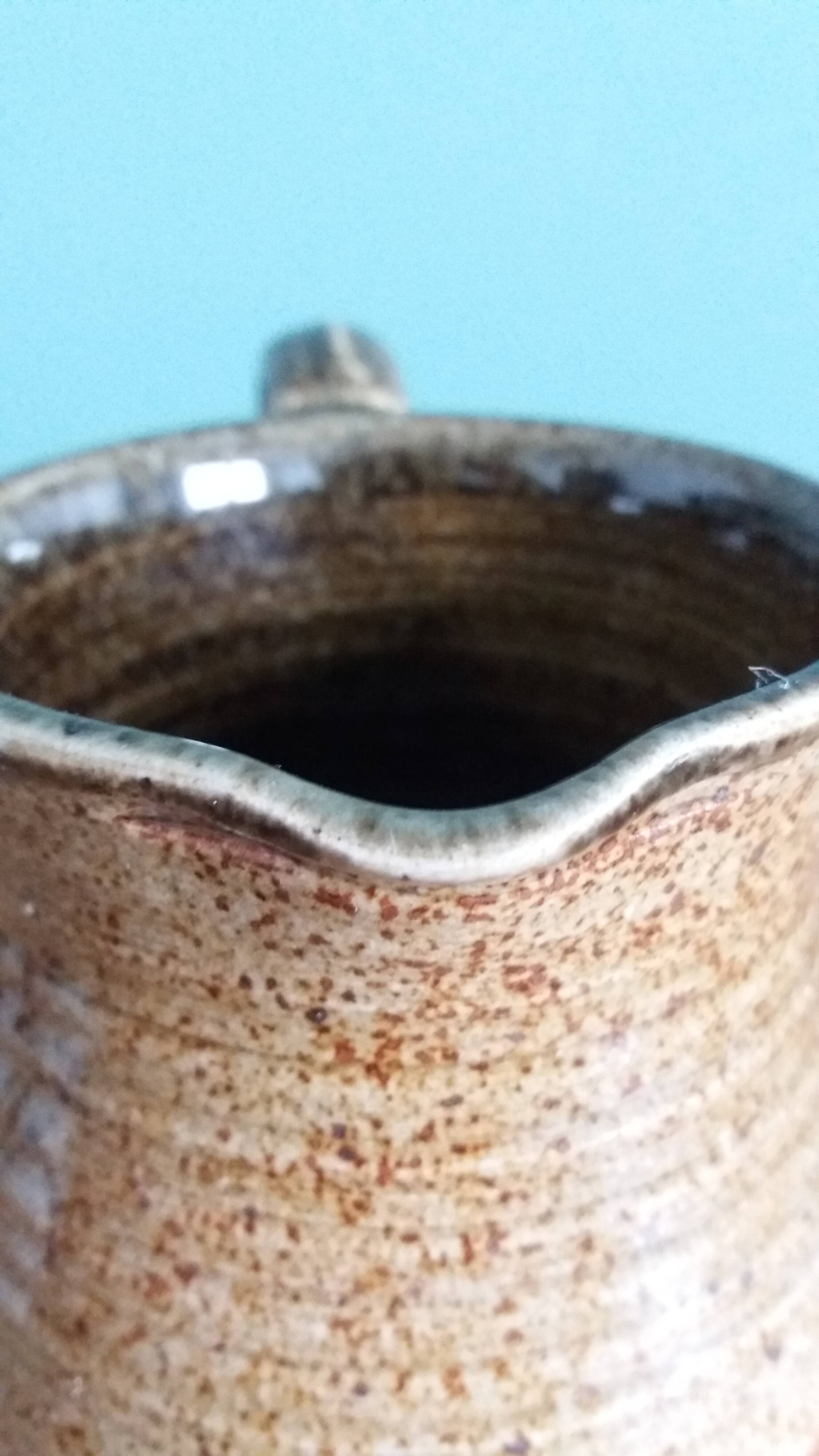 Jug with a milk jug signed, Beceleuf