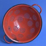 Vintage red enameled sheet metal colander