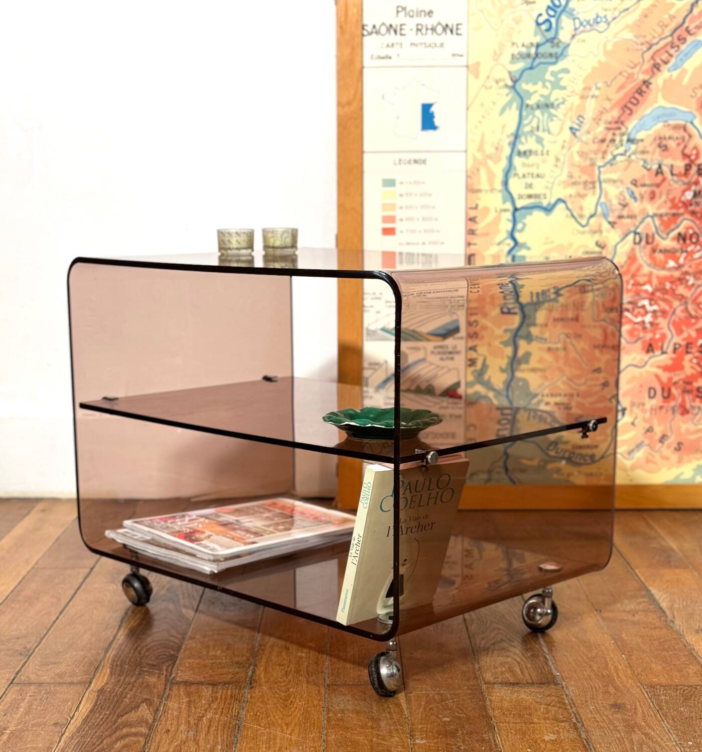 Smoked Plexiglas coffee table on wheels -