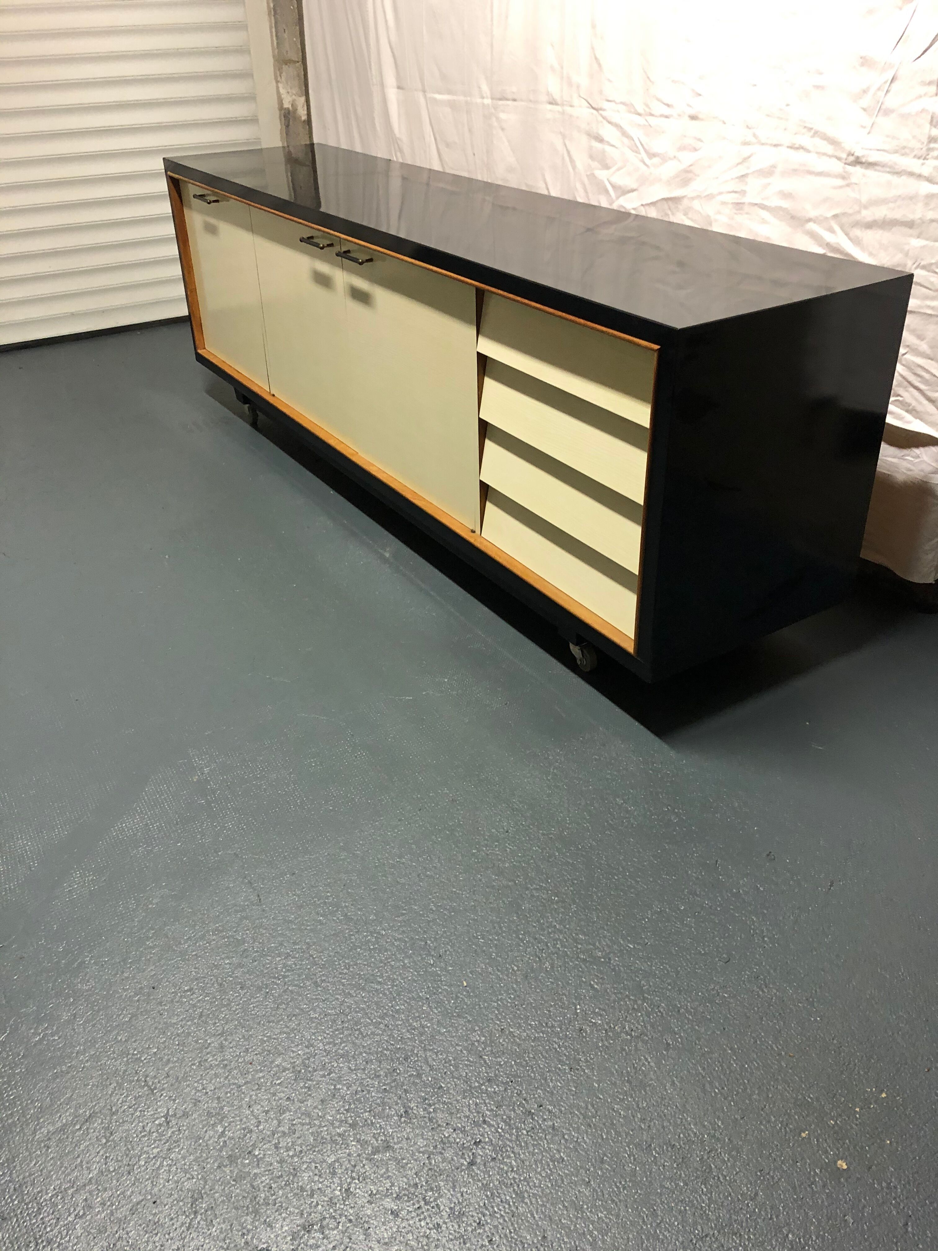 Sideboard in wood and black laque, circa 1960s