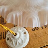 Opaline corolla suspension