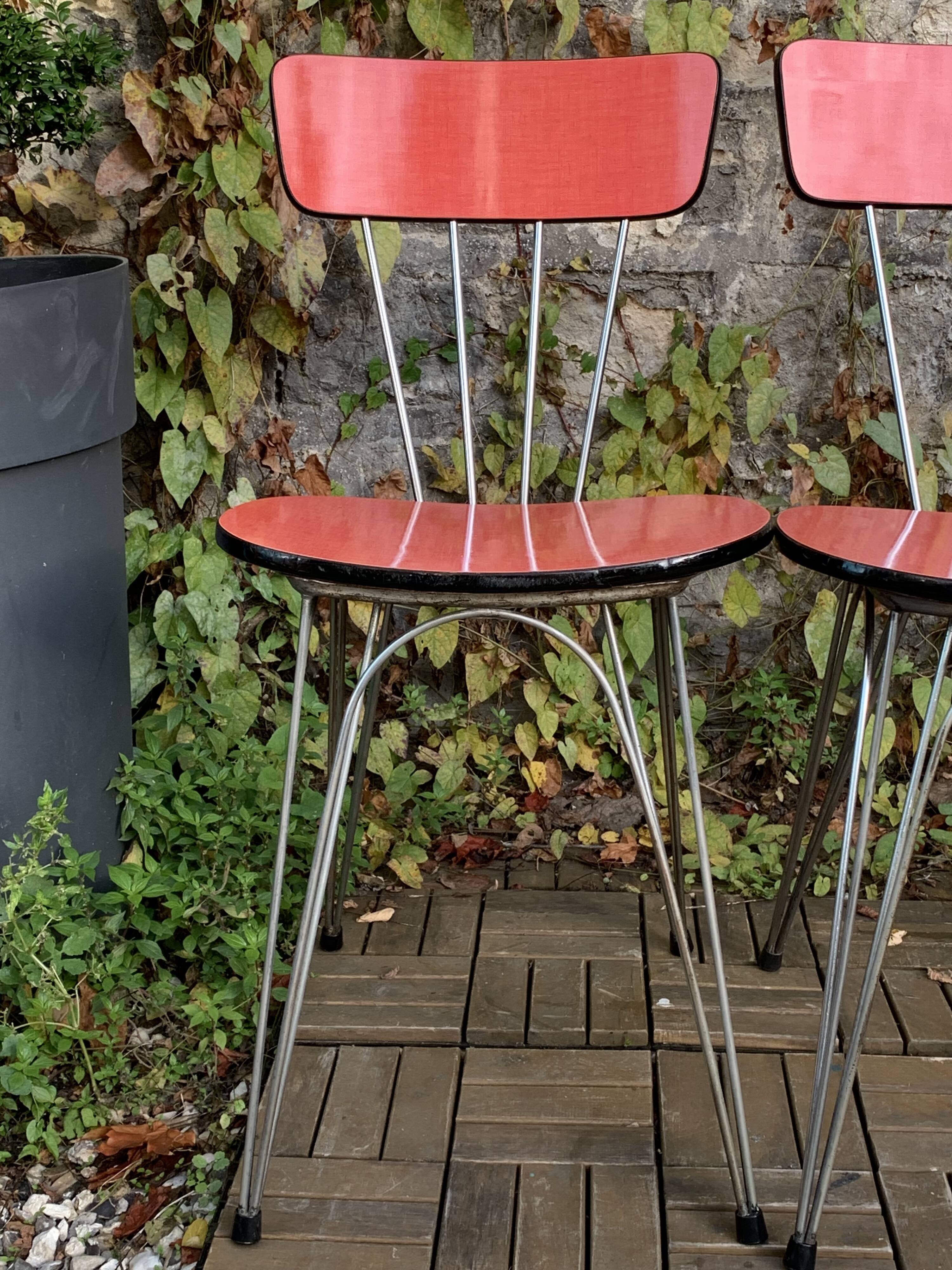 4 red Formica chairs with Eiffel legs, 1950s