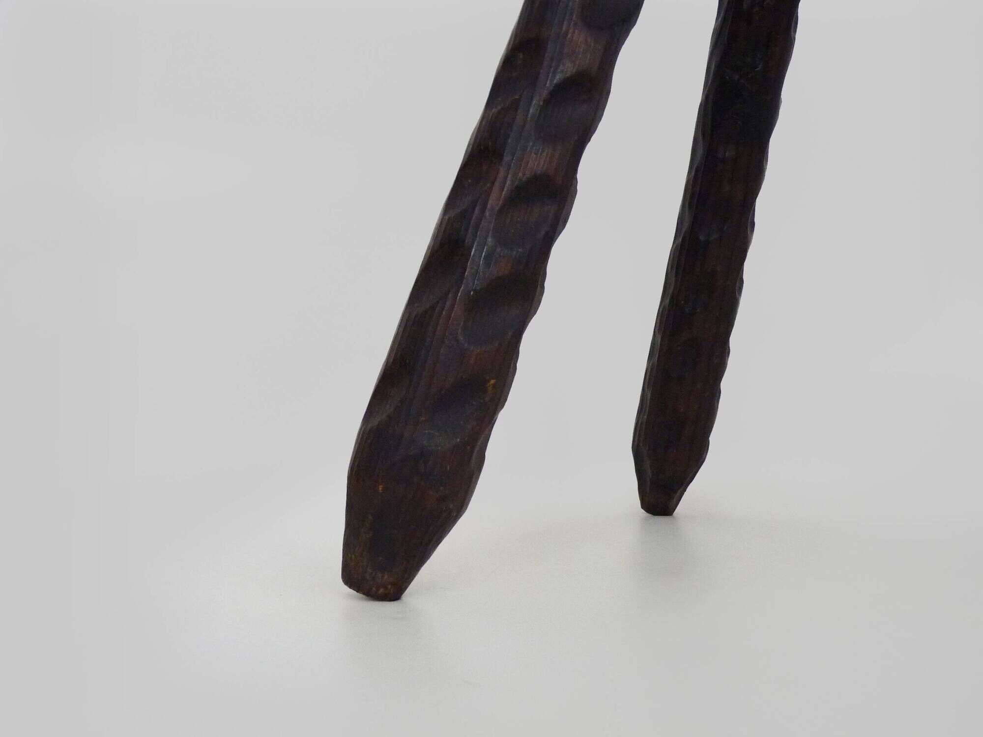 Brutalist tripod chair in raw wood. solid wood chair