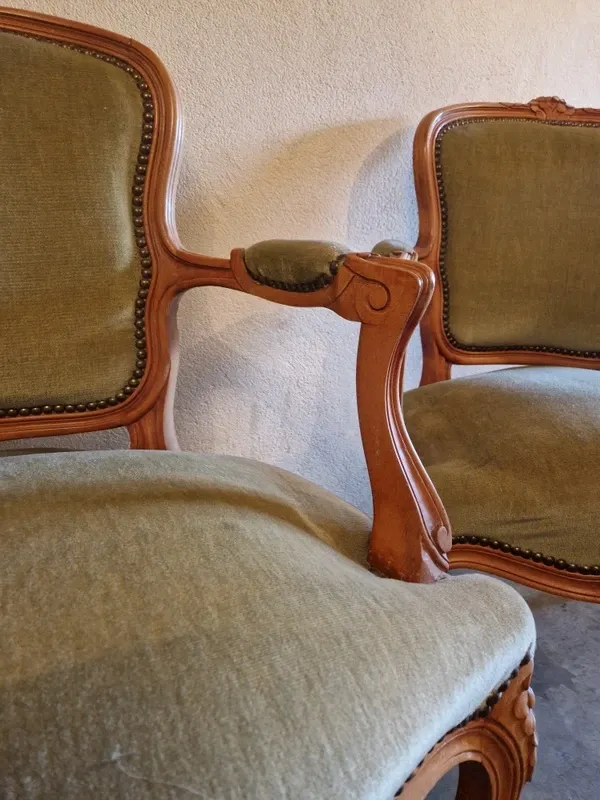 Pair of Louis XV style armchairs in cherry wood, upholstered in green velvet.
