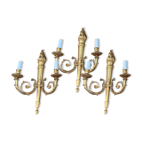Set of three Empire-style candlesticks.