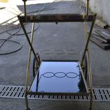 Rolling cart in brass and smoked glass