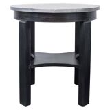 Round Art Deco black painted wooden side table with lower shelf, 1930s.