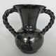 Black vase with twisted handles signed Blaise Rubino in Vallauris, circa 1950/1960