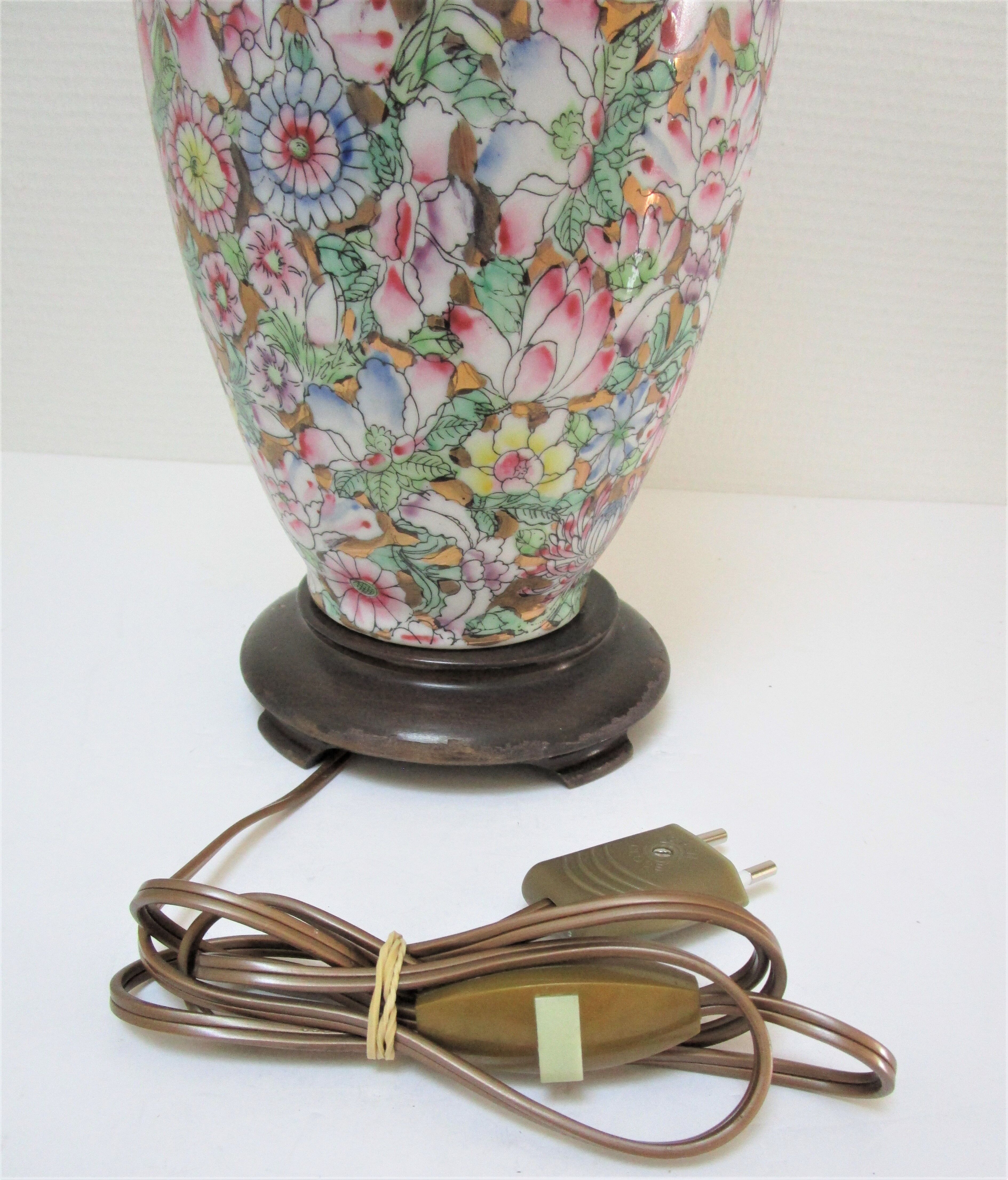 Chinese porcelain lamp foot with polychrome decoration of vintage flowers