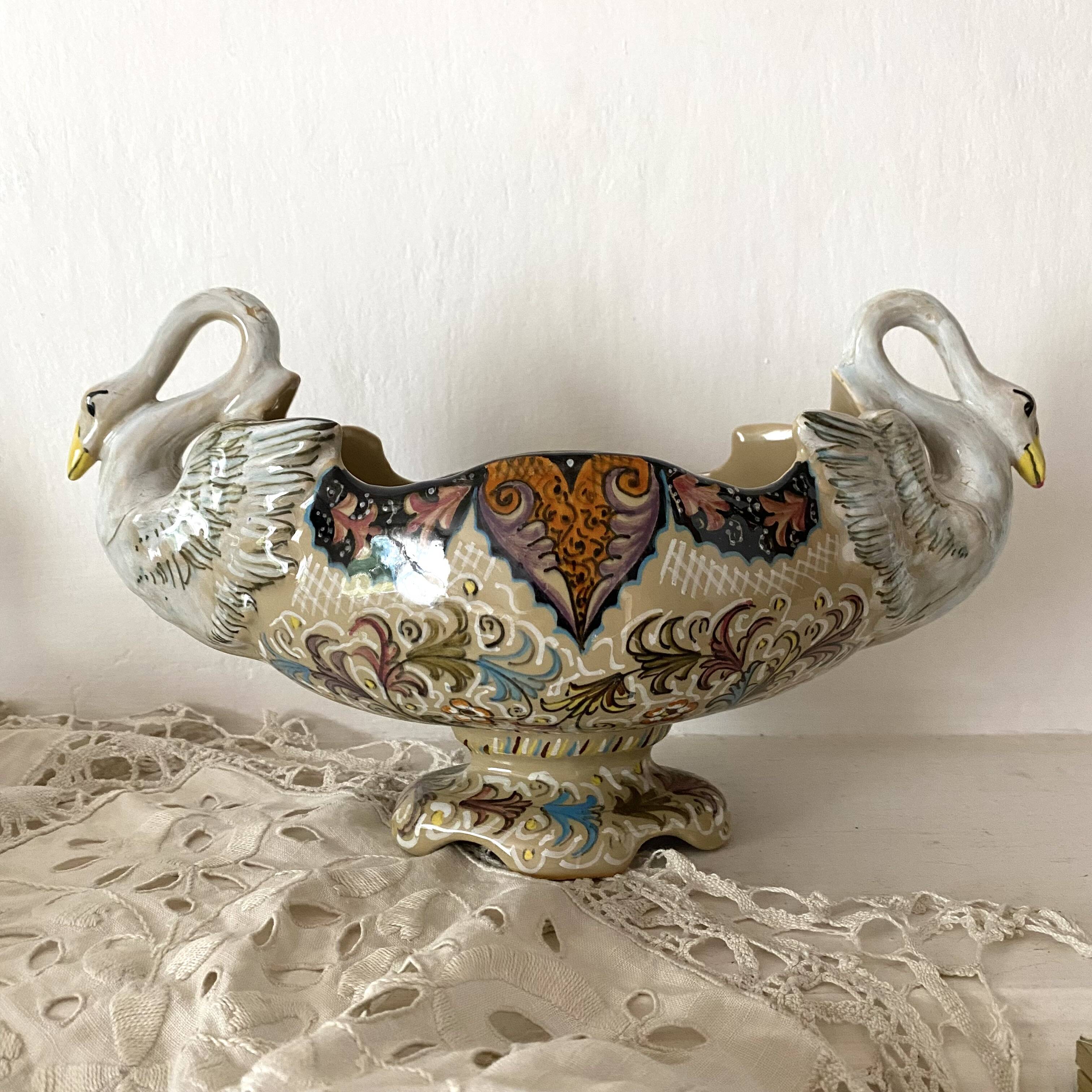 Molaroni planter, Pesaro, Italy, swans
