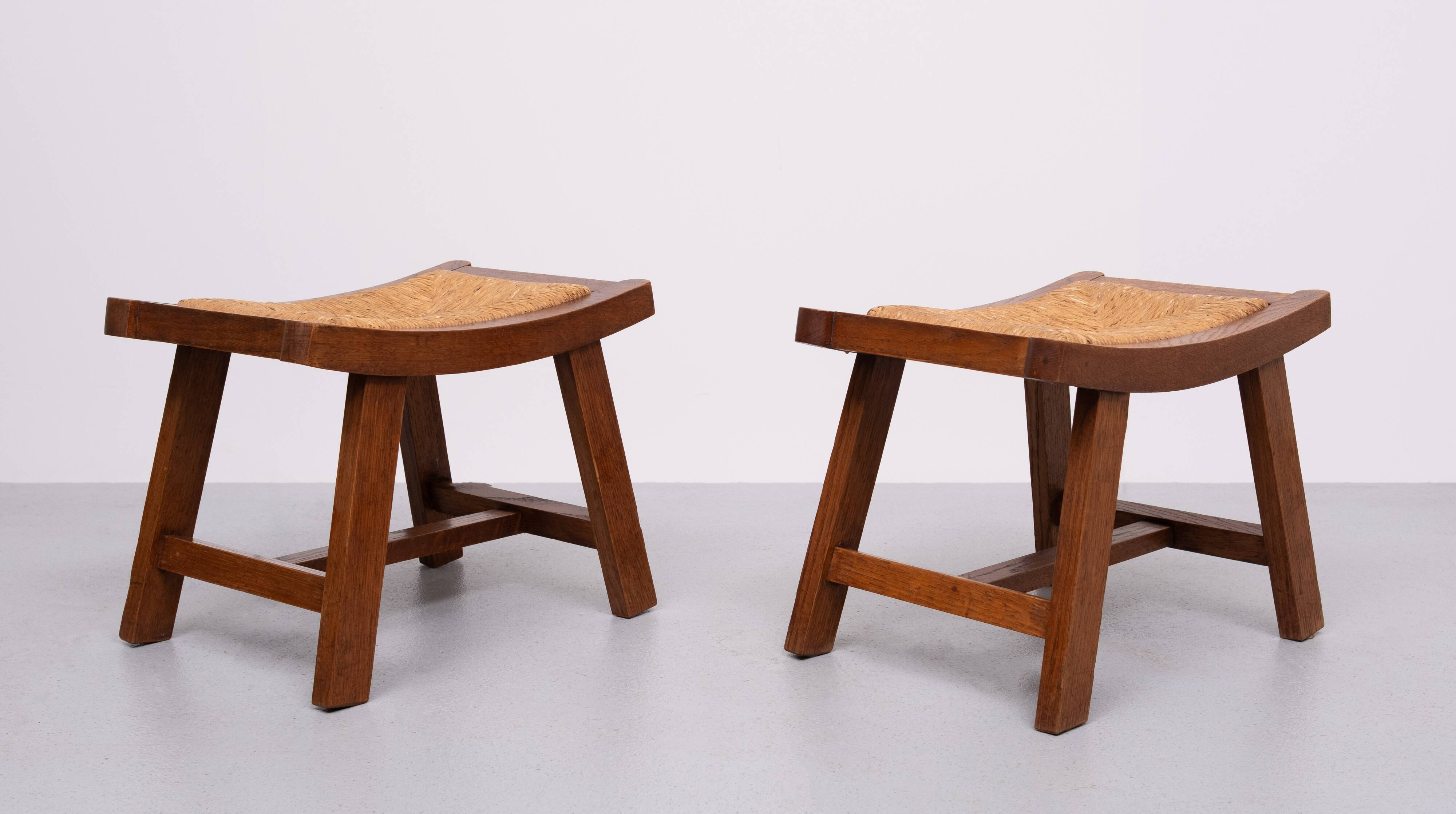 Brutalist curved solid Oak Ottomans 1950s France