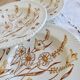 4 vintage deep plates with a brown floral design