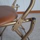 Chaise pliante structure tube et simili cuir